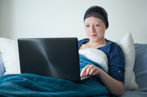 Sick young woman and relax in hospital bed.