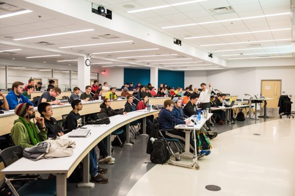 Students and faculty collaborating in shared spaces in the new GG Brown addition.