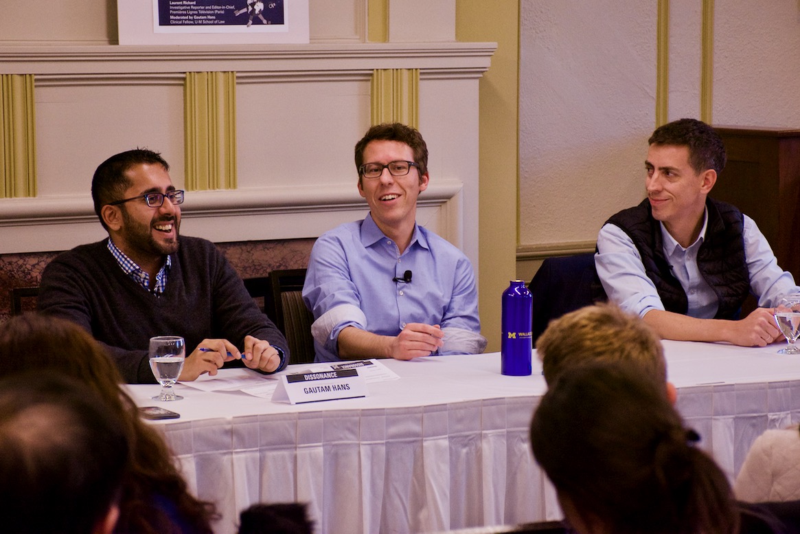 The panelists and moderator share a laugh