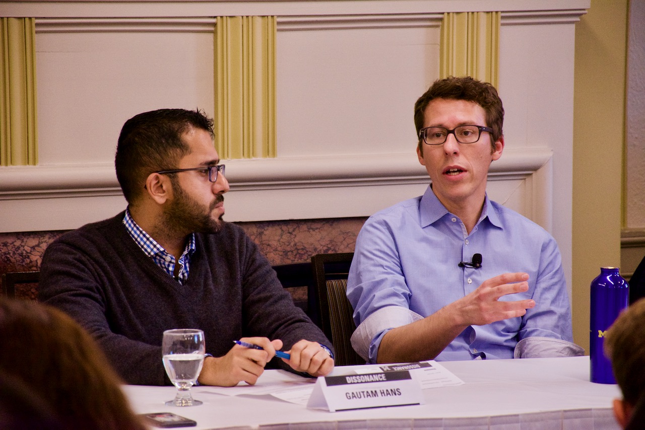 Panelist Bastian Obermayer gesticulates with his hand to emphasize his point