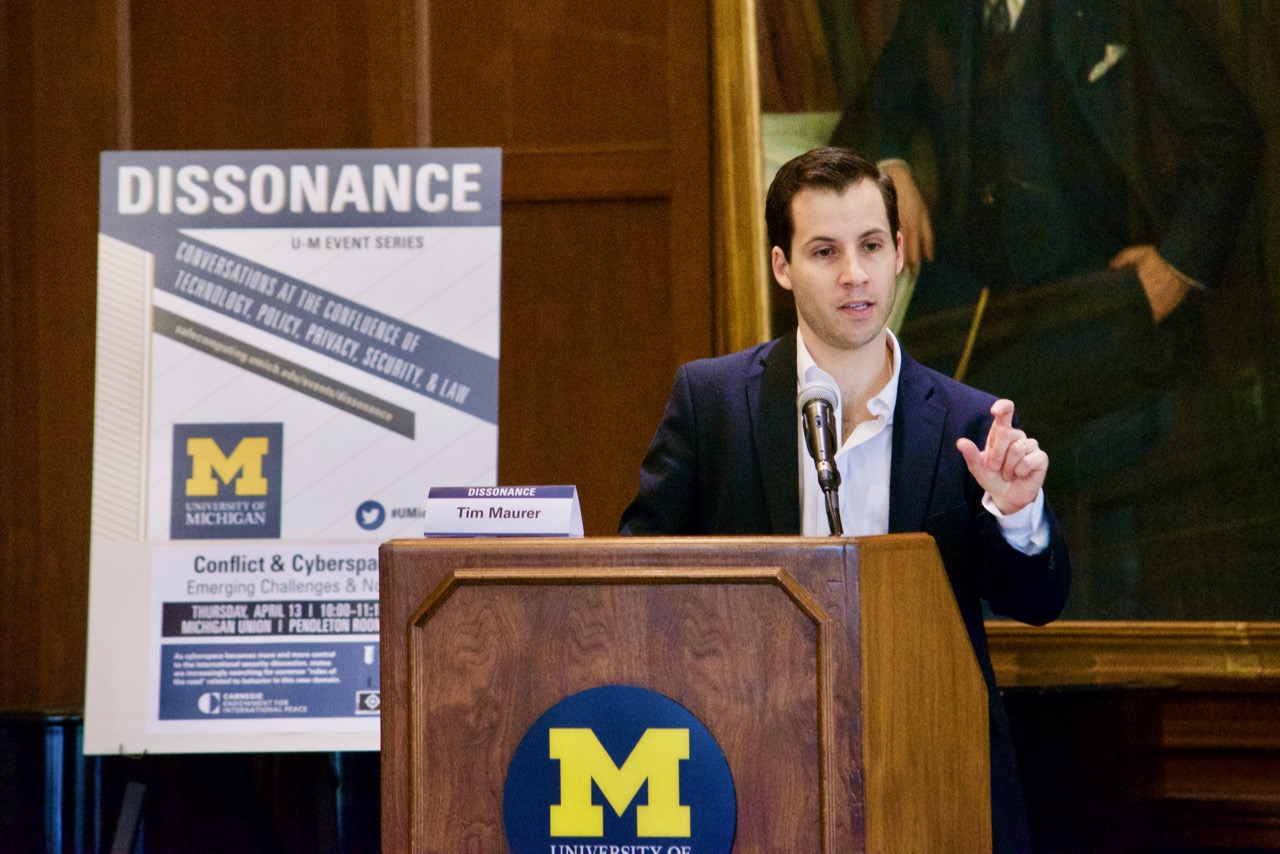 Tim Maurer speaks at the podium