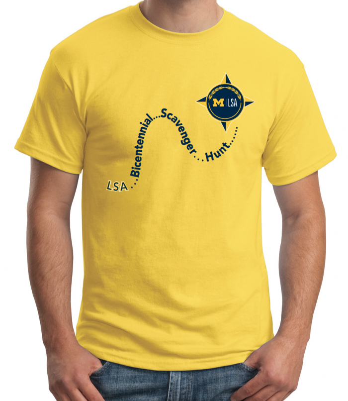 A photo of a man wearing the maize-colored LSA Staff Bicentennial Scavenger Hunt T-shirt