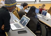 A U-M undergraduate videoconferences with students in the Middle East and North Africa