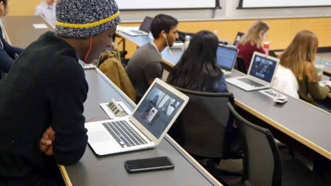 A U-M undergraduate videoconferences with students in the Middle East and North Africa