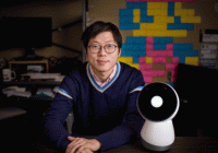 Jeff Huang with Jibo robot