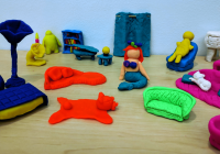 Play-Doh models arranged on a table.