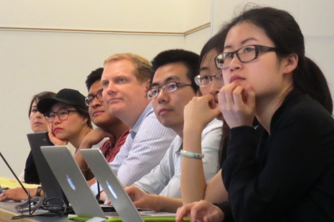group of men and women in training workshop
