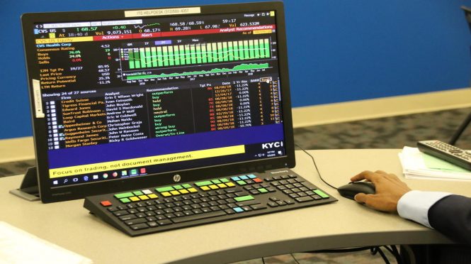 computer terminal screen showing financial data