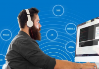 man sitting at computer using Deque software & wearing headphones