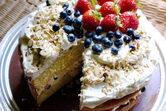 layer cake with cream and berries