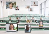 classroom with student faces displayed on various devices