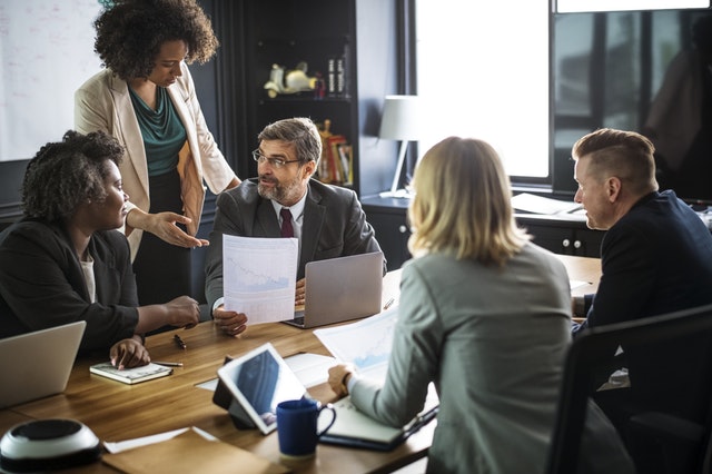 diverse group of people in meeting