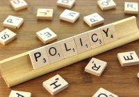 the word "policy" spelled out in scrabble letters