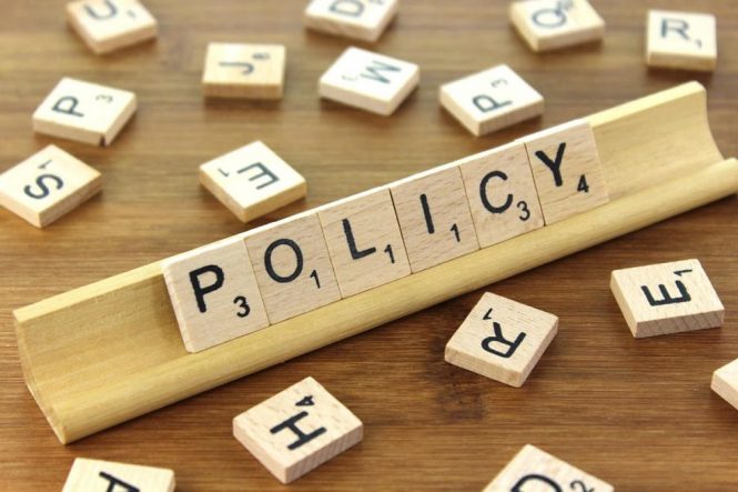 the word "policy" spelled out in scrabble letters