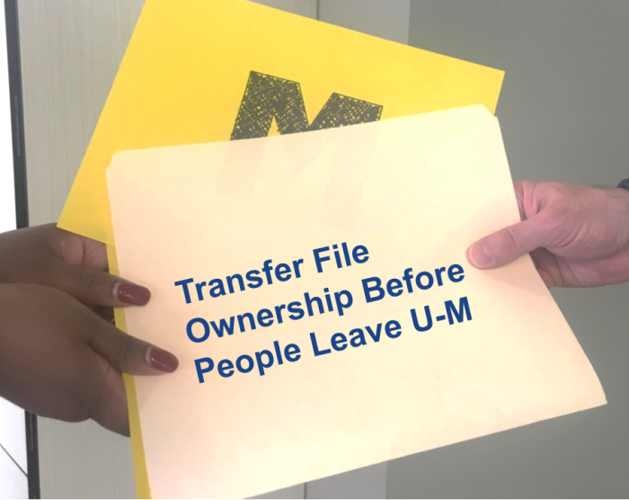 file being handed between two peopls