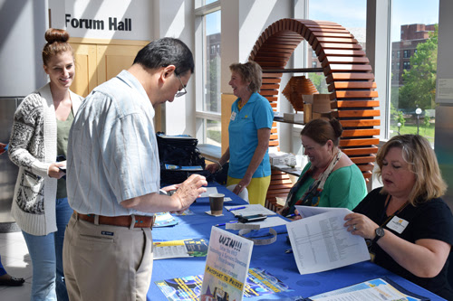 attendees registering for event