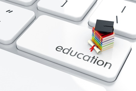 graduation cap with books icon on the keyboard