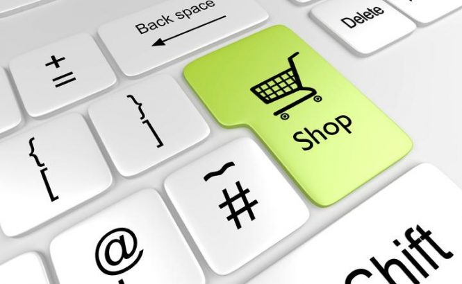 keyboarc with green key that says "shop" with cart icon