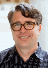 A headshot of Mark Newman