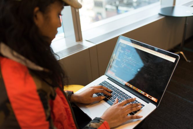 A student uses a laptop