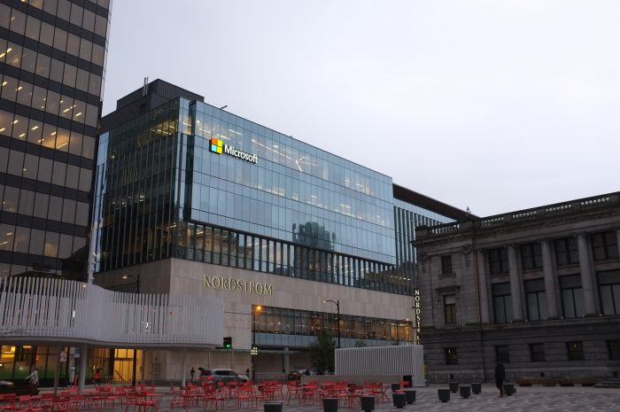 Photo of a large, glass Microsoft building.