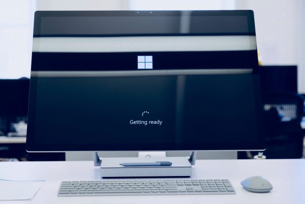 (Photo of black monitor with the Window’s logo of four squares close together with the words, “Getting ready” beneath them with a loading symbol.)