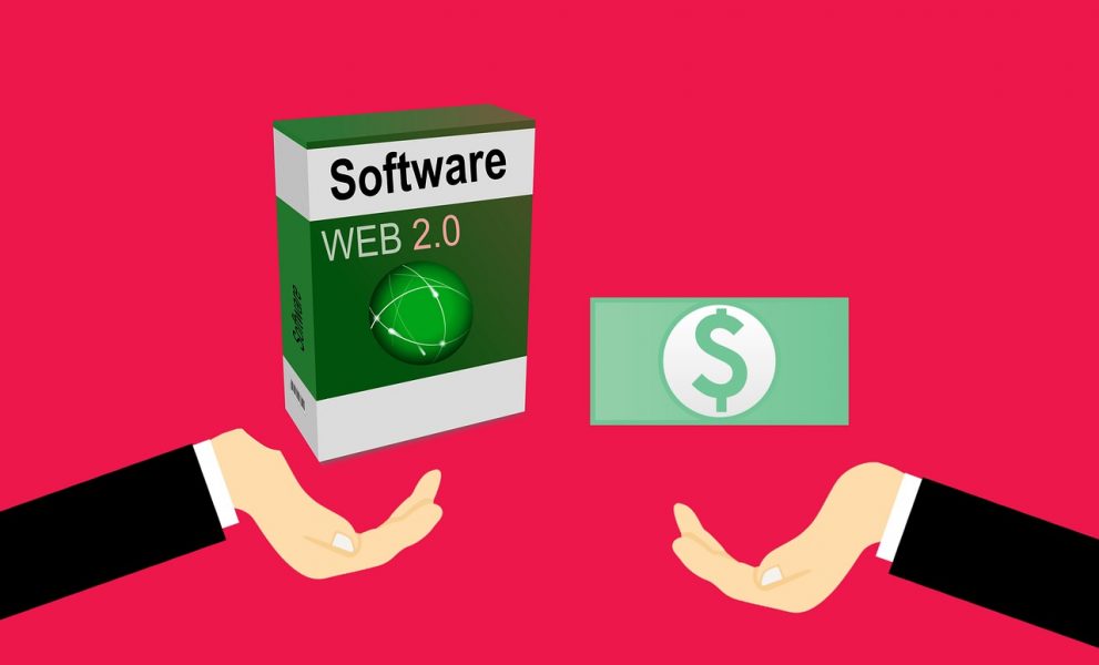 two hands, one holding software box, the other, money