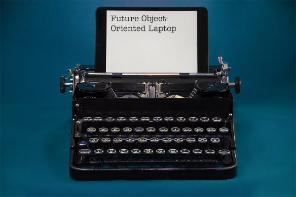 A typewriter with an iPad propped up where the paper usually
goes. The iPad reads "Future Object-Oriented Laptop"