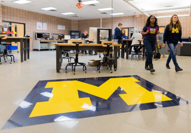 Students walk around and work at the computing center on North Campus.