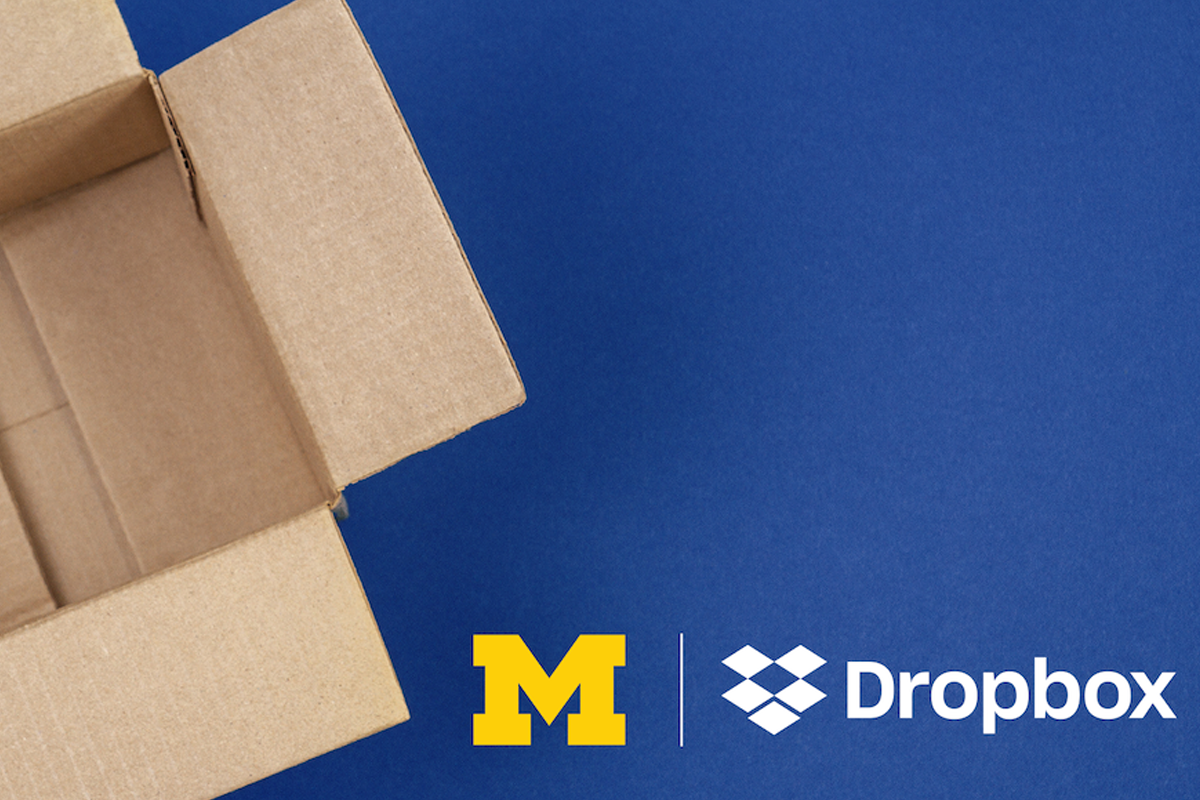 An open cardboard box against a blue background with the U-M block M logo and Dropbox logo.