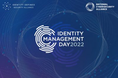 Identity Management Day text over a blue background with a white fingerprint icon
