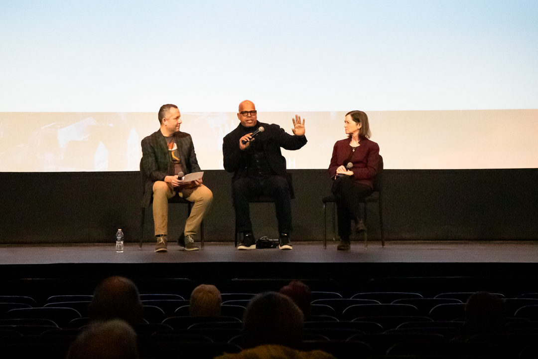 Pictured from left to right: Sol Bermann, Christian Davenport, and Barbara L. McQuade sitting on stage at the Michigan Theater discussing disinformation and the power of democratic practices after the 1984 40th-anniversary screening.