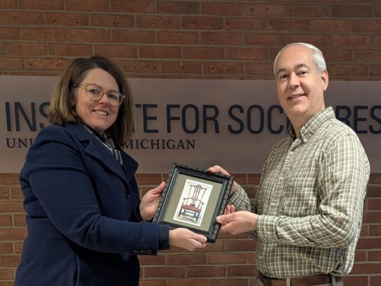 Cathy Curley passes the STAC Chair to Marcus Blough in January 2025.