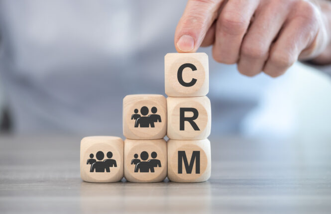Concept of CRM on wooden blocks