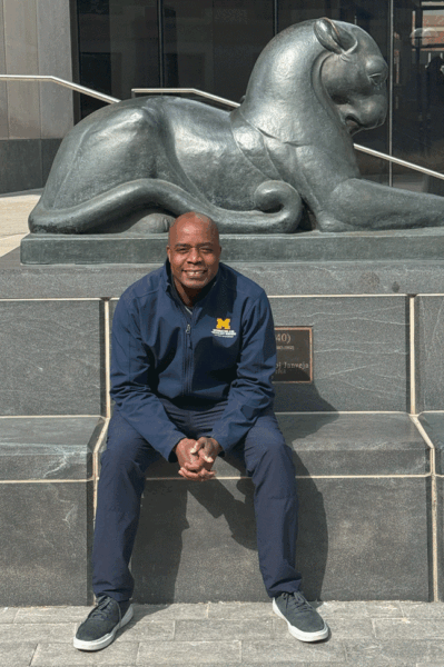 JD Jordan sitting with a Ruthven puma