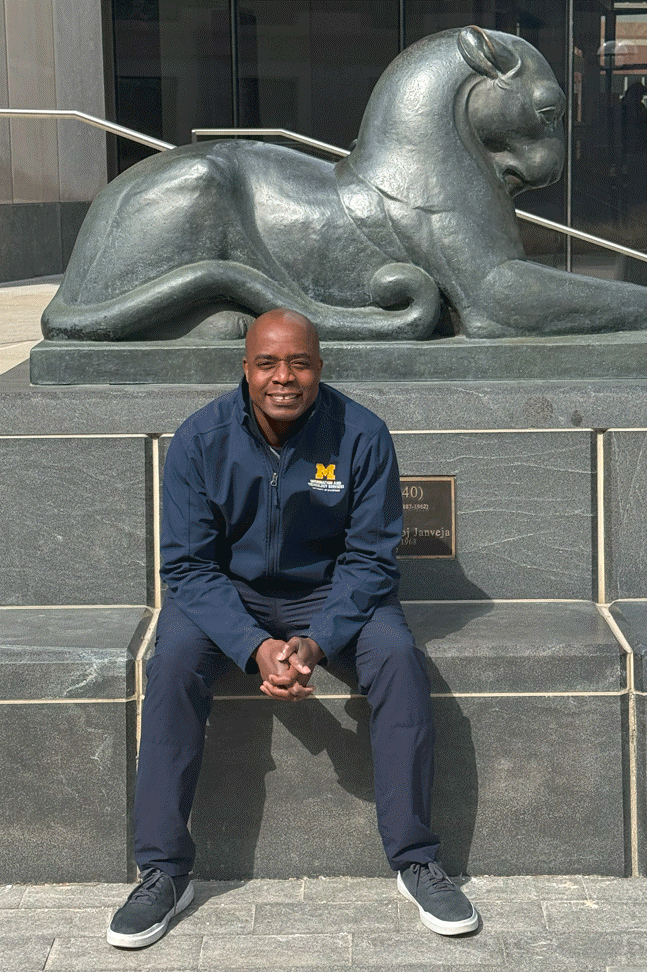 JD Jordan sitting with a Ruthven puma