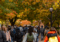 Michigan students walking through the Diag among fall colors
