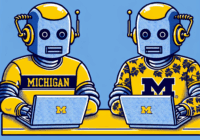 Two robots in yellow helmets and Michigan-themed shirts work at laptops with the University of Michigan logo on a blue and yellow background.