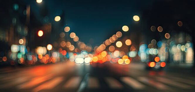 Blurry city street at night