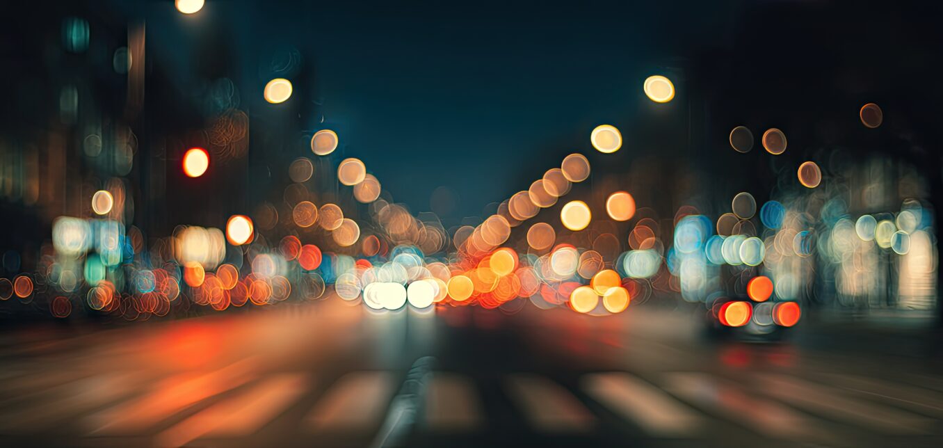 Blurry city street at night