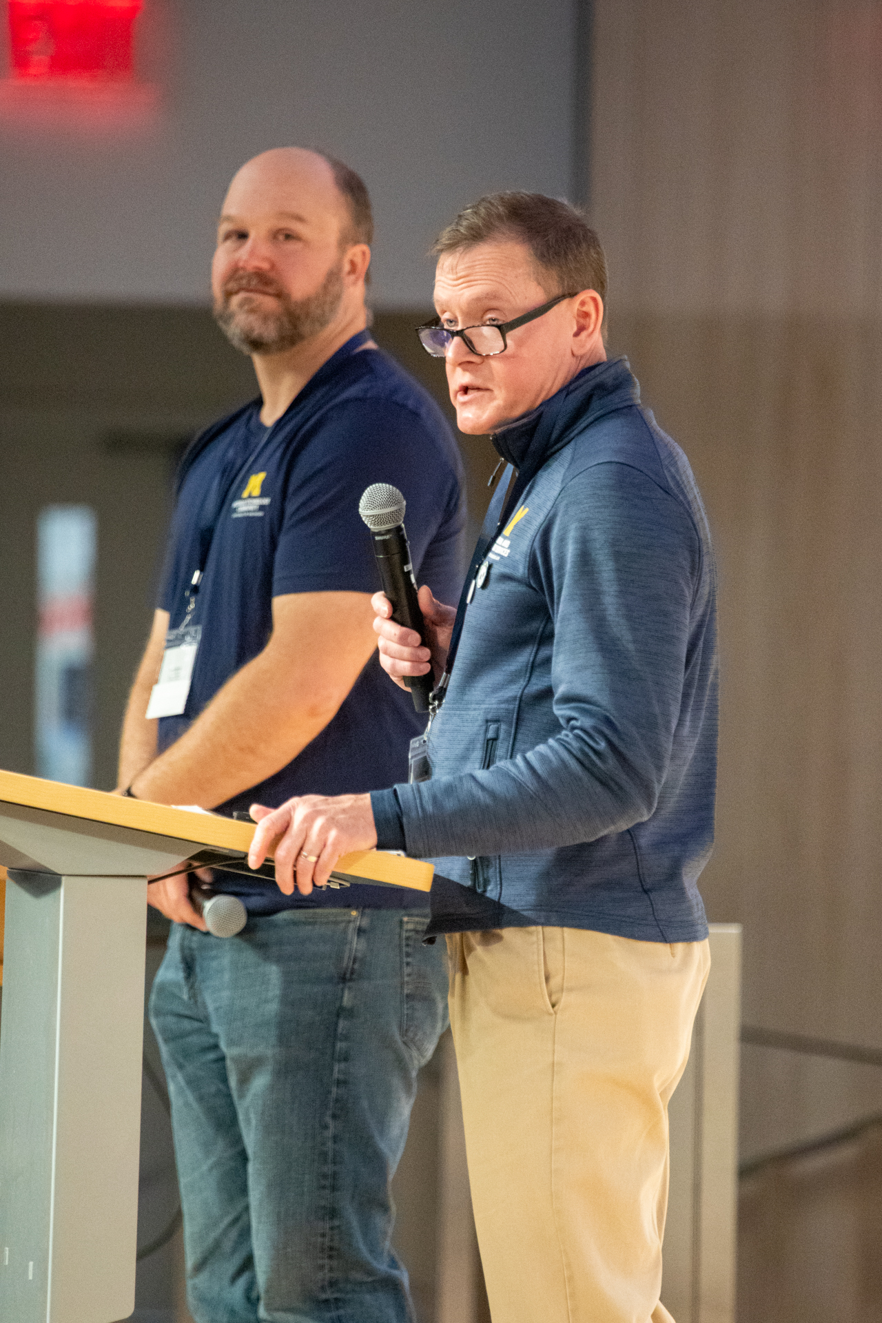 Ben Andies (left) and Dan Burgess (right) speaking at the MTech Connect Symposium