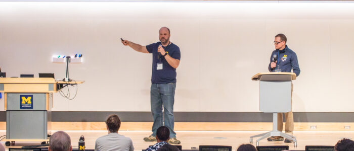 2025 MTech Connect-article-05 Ben Andies (left) and Dan Burgess (right) speaking at the MTech Connect Symposium